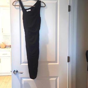 Bailey 44 Size Small Sexy Cutout Black Dress with asymmetrical shoulder straps.